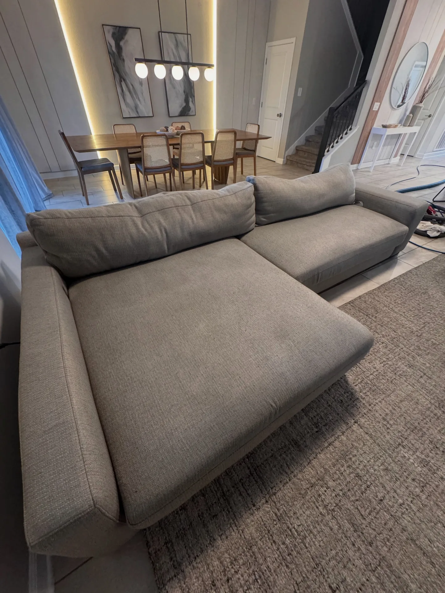 Light sectional sofa from the front angle after professional upholstery cleaning by Everglades Cleaning Solution