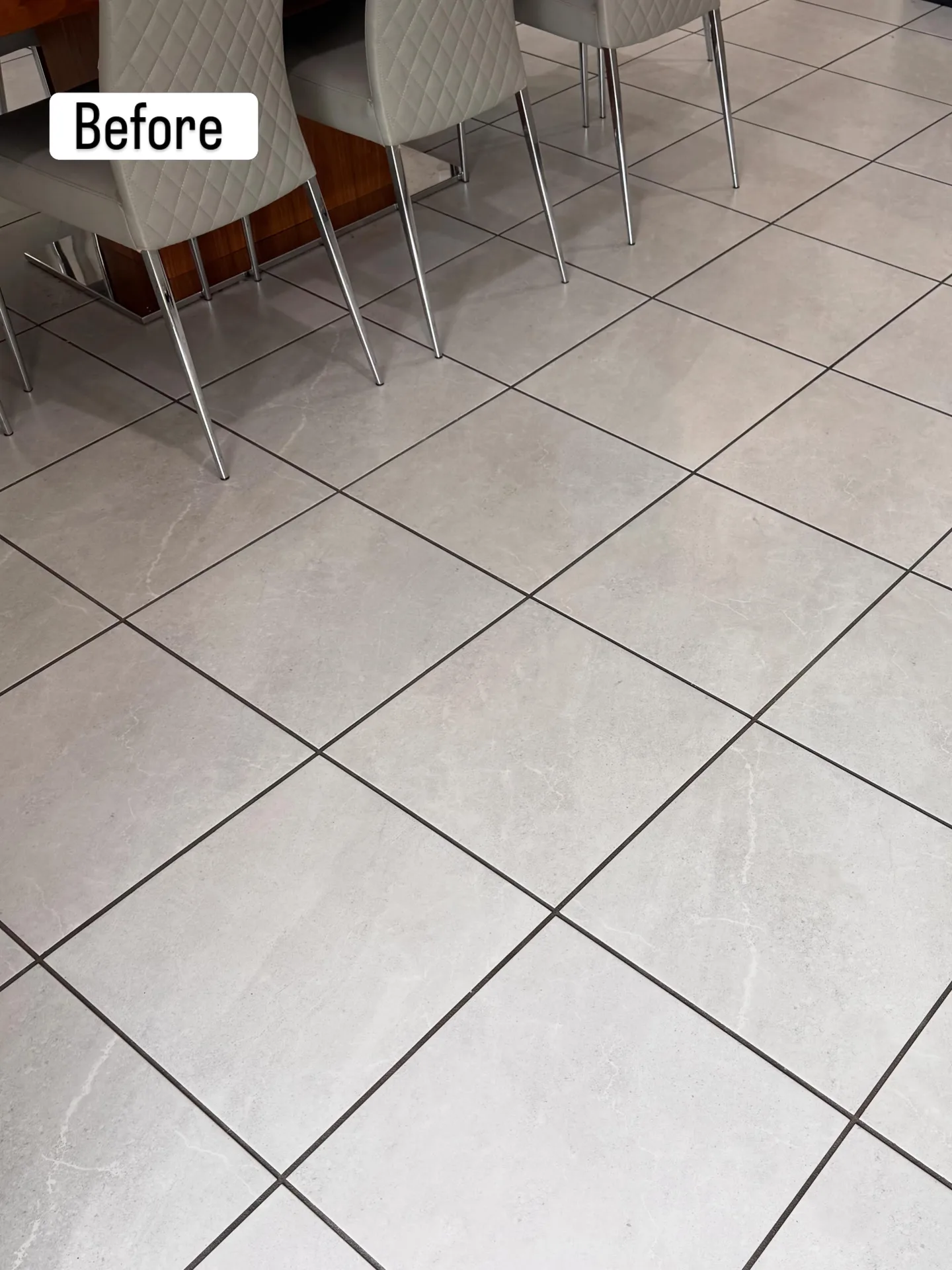 Residential tiled floor from a second angle before professional tile & grout by Everglades Cleaning Solution